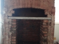 Original bricks restored, new brick surround built and lintel in place